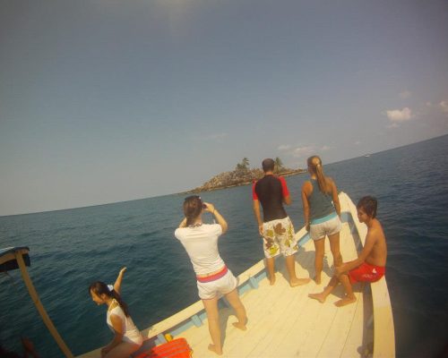 Participants on a boat to island