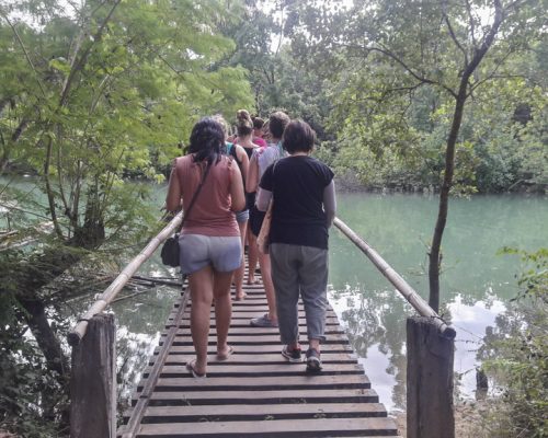 Participants walking on a brige