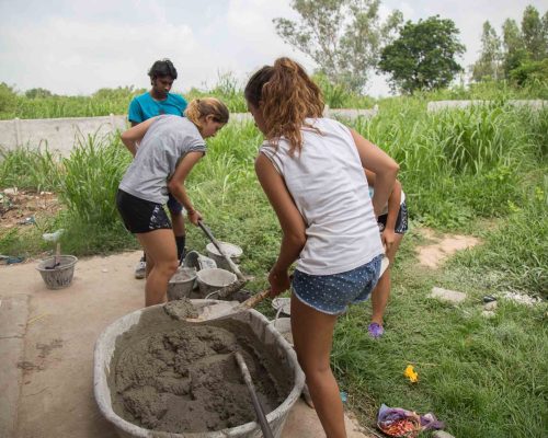 Putting cement in buckets