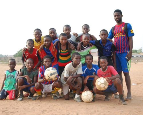 group of local Ghanaian kids on football team