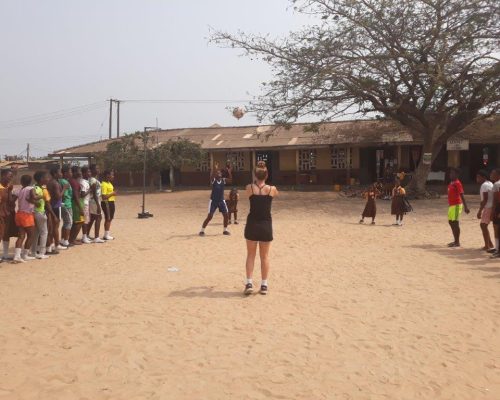 teaching children on football skills