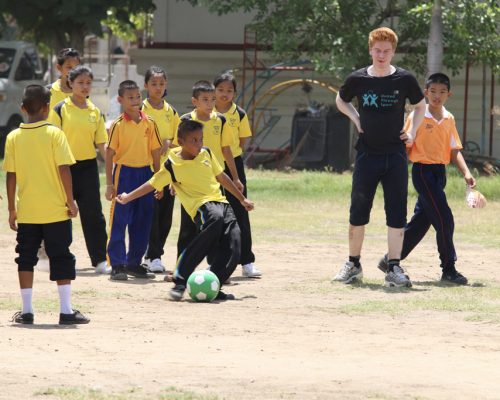 Student playing football