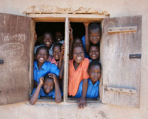 _Students from a local school enjoying a photo moment