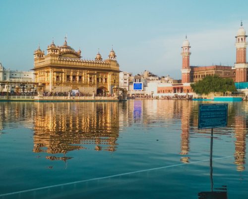 beautiful lake with buildings in India