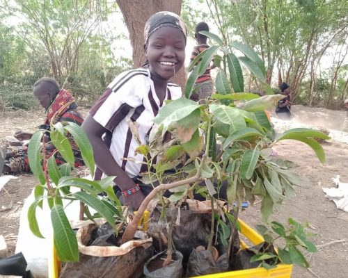 child with plant