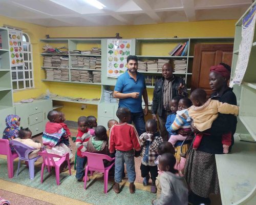 childcare volunteer with kids