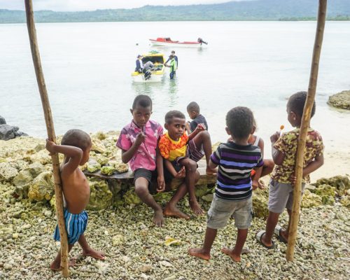 children by the water