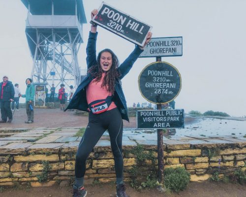 girl by poon hill trek