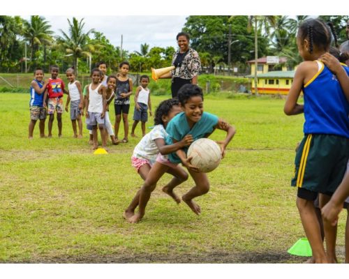 kids playing football