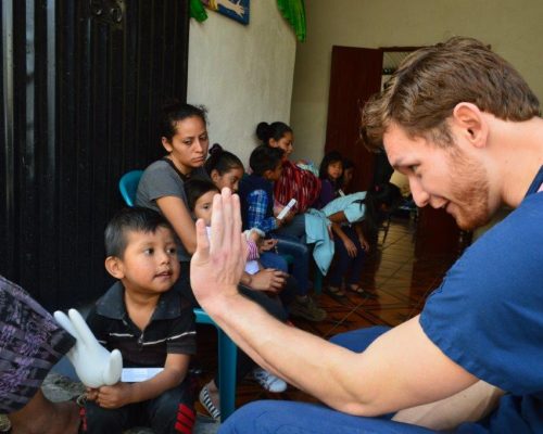 doctor high fiving a child