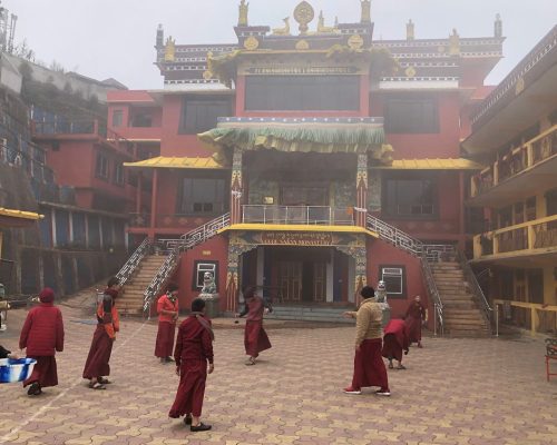 monks in courtyard