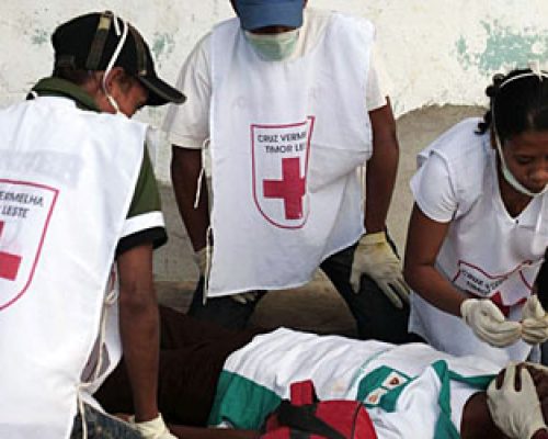 red cross giving blood volunteers