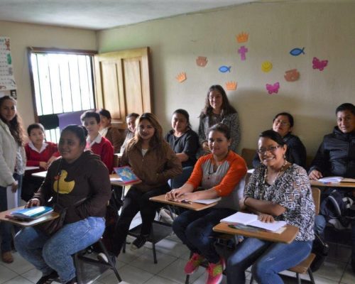 adult students sitting at desk