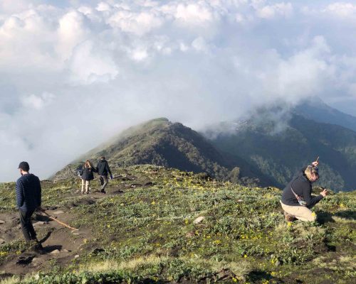 walking on top of hills over mountains