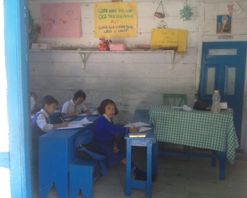 kid at desk